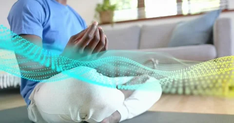 Timer initiating colorful wave showing energy flow across man hands and legs for Stock Footage 316891209