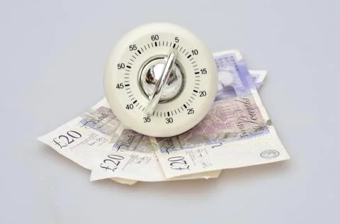 Timer over notes Timer over banknotes Copyright: xZoonar.com/PaulxWishartx... 스톡 사진