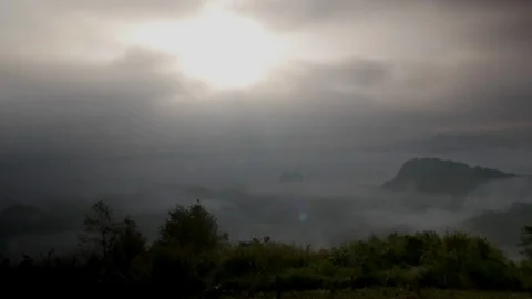 Times lapse cloud rolling over the layer of different sizes of the mountain Stock Footage 118505513