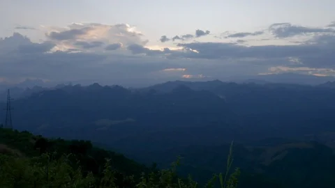 Times lapse of clouds are rolling over the mountain Stock Footage 118504698