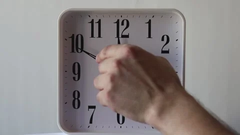 Time's up.Move the clock hands ten minutes ahead Stock Footage 139940252