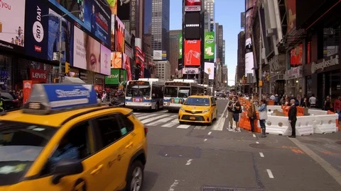 Times Square, Camera almost passes over taxi Stock Footage 108550723