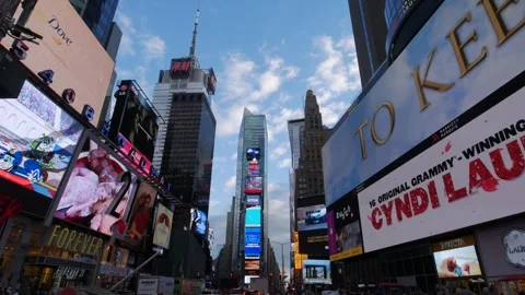 Times Square Commercial Intersection and Theater District Plaza Night Stock Footage 337513640