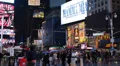 Times Square Illuminated Night Busy Tourist People Intersection Neon Commerce HD Footage