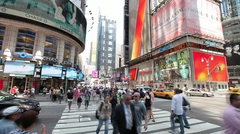 Times Square intersection people walking time lapse 25p Stock Footage