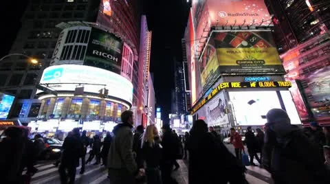 Times Square New York City NYC NY people walking crossing street crowd slow Stock Footage