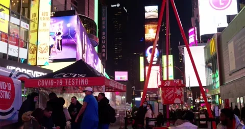  Times Square at night. Covid testing station in NYC. Busy Times Square Video stock 219883938