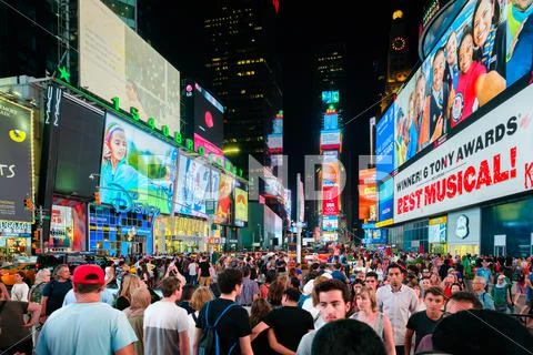 Times Square at night in New York City Stock Photos