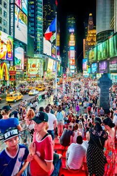 Times Square at night in New York City Stock Photos