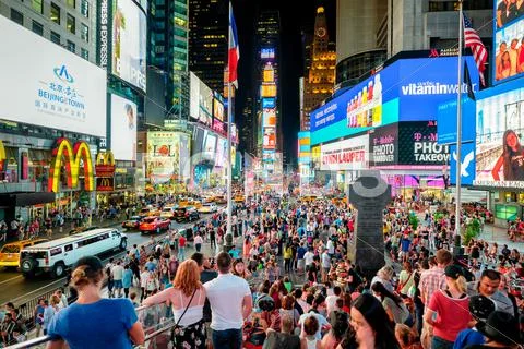 Times Square at night in New York City Stock Photos