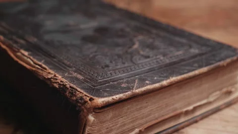 Timeworn Bible with delicate pages Stock Footage 290013895