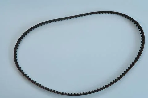 Timing belt on a blue background . Stock Photos