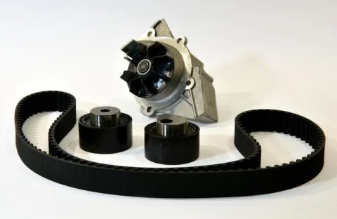 The timing belt, rollers and water pump stands on a white background Stock Photos