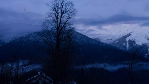 Timlaps sunset over buildings of the Rose Plateau in Sochi, mountain ski resort  Stock Footage 93310852