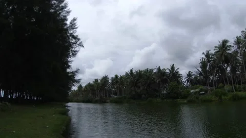 Timlapse of clouds before the rain by the lake Stock Footage 220687375