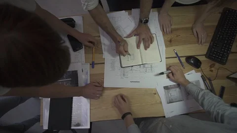 Timlapse, a group of architects working in the office during a brainstorming Stock Footage 95932557