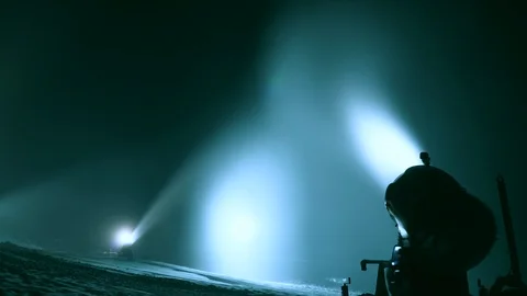 Timlipse of Snow making system. A snow cannon sprays water and makes snow Stock Footage 124277671