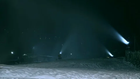 Timlipse of Snow making system. A snow cannon sprays water and makes snow Video stock 124277894