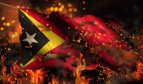 Timor leste burning fire flag war conflict night 3d Stock Illustration