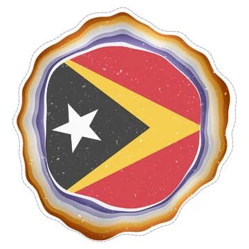 Timor-Leste flag in frame. Badge of the country. Layered circular sign arou.. Illustrazione stock