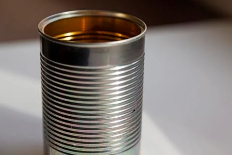 A tin can that is empty and stands on the kitchen table Stock Photos