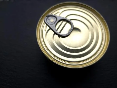 Tin Can With Key in a Close View Showing the Metal Texture and Pull Tab Des.. Stock Photos