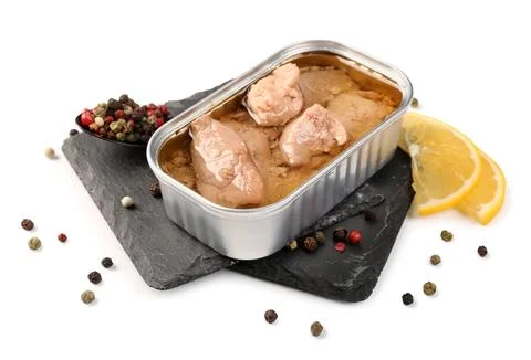 Tin can with tasty cod liver and spices isolated on white background, closeup Stock Photos
