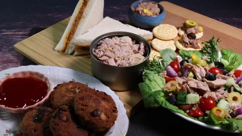 Tin can tuna fish meat chunk flake product recipes  Stock Footage 149190004