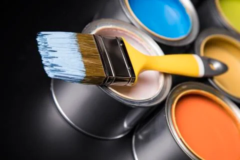 Tin cans with paint and brushes Free Stock Photos