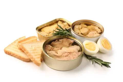 Tin cans with tasty cod liver, rosemary and bread isolated on white backgroun Stock Photos