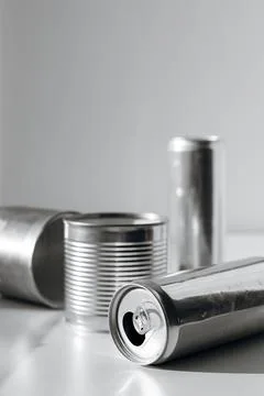 Tin cans on white background, representing recycling, reuse, and eco-friendly Stock Photos