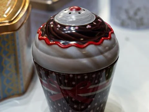 A tin container for candy and chocolates painted to resemble a milkshake Stock Photos