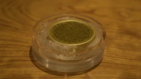 Tin of Greenish Spheres Served on Ice in Beijing Restaurant Close-Up Stock Footage 345762297