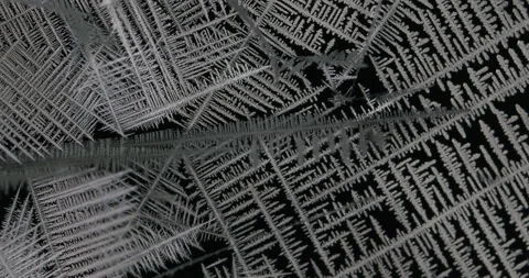 Tin metal element forming process under microscopy 4k timelapse video Stock Footage 116792293