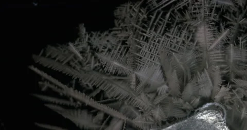 Tin metal element forming process under microscopy 4k timelapse video Stock Footage 116792383