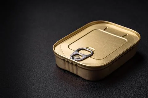 Tin or aluminum rectangular can of canned food with a key Stock Photos