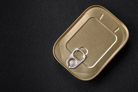 Tin or aluminum rectangular can of canned food with a key Stock Photos