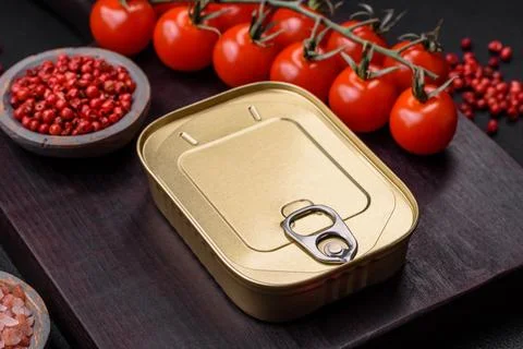 Tin or aluminum rectangular can of canned food with a key Stock Photos
