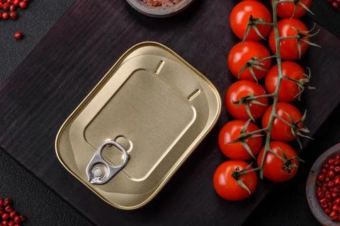 Tin or aluminum rectangular can of canned food with a key Stock Photos
