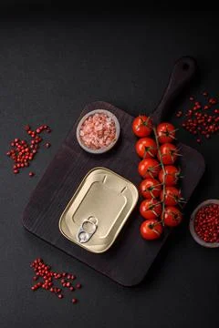 Tin or aluminum rectangular can of canned food with a key Stock Photos