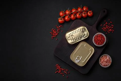 Tin or aluminum rectangular can of canned food with a key 스톡 사진