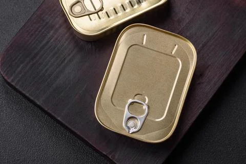 Tin or aluminum rectangular can of canned food with a key Stock Photos