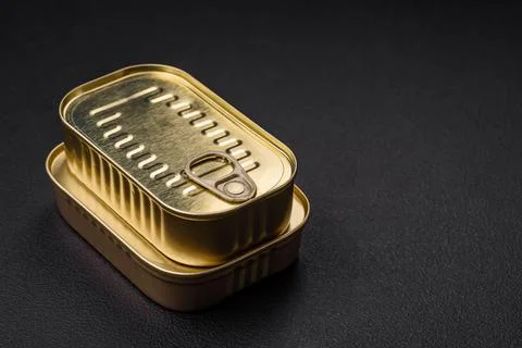 Tin or aluminum rectangular can of canned food with a key Stock Photos