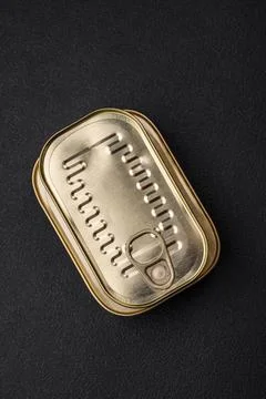 Tin or aluminum rectangular can of canned food with a key Stock Photos