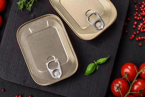 Tin or aluminum rectangular can of canned food with a key Stock Photos