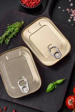 Tin or aluminum rectangular can of canned food with a key Stock Photos