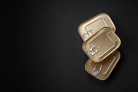 Tin or aluminum rectangular can of canned food with a key Stock Photos