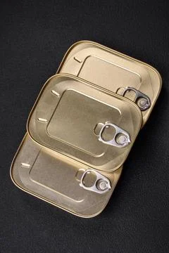Tin or aluminum rectangular can of canned food with a key 写真素材