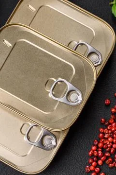 Tin or aluminum rectangular can of canned food with a key Stock Photos