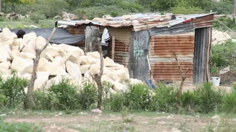 Tin shack in Haiti Stock Footage 21575331